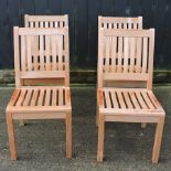 A set of four teak garden chairs,