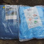 A collection of various tarpaulins,