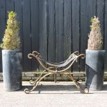 An iron x-frame stool, together with a pair of grey garden planters,