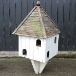 A white painted wooden dovecot,