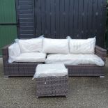 A rattan sofa, in two parts, longest 140cm,