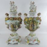 A pair of large Meissen style floral encrusted vases and covers on stands,