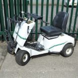 A Golf Xpress 24 volt single passenger golf buggy