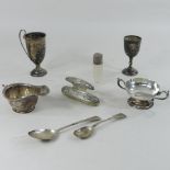 A collection of silver items, to include a small trophy,