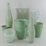 A green glass goblet shaped vase, 37cm tall,