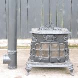 A French cast iron stove, with chimney,