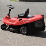 A Mountfield 725M red ride on petrol lawn mower