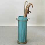 A Burmantofts faience turquoise glazed stick stand, with impressed marks to base, 65cm tall,
