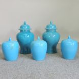 A pair of blue glazed porcelain ginger jars, 48cm tall,