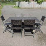 A rattan garden table, 151 x 91cm,