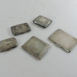 A collection of early 20th century and later silver cigarette cases,