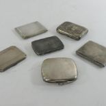 A collection of early 20th century and later silver cigarette cases,