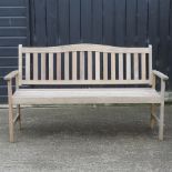 A teak garden bench,