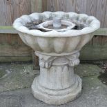 A fibreglass garden fountain,
