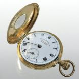 A Swiss 14 carat gold ladies half hunter pocket watch,