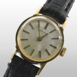 A Longines ladies gold plated wristwatch, the white dial with baton hours,