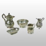 A Victorian silver cream jug, London 1846, 9cm tall, together with another smaller, a sugar bowl,