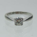 A platinum and diamond set single stone ring, approximately 0.