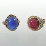 A large 9 carat gold and blue stone cabochon set ring,