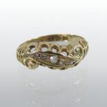 An 18 carat gold and diamond ring,