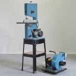 A Clarke woodworker band saw, on a stand, 150cm overall,