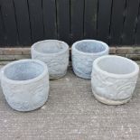 A pair of circular reconstituted stone pots, together with another pair,