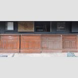 A collection of wooden panelling, largest 527cm long,