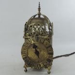 An 18th century style brass lantern clock,