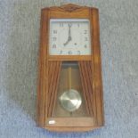 A 1920's drop dial wall clock, with an eight day movement,