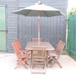 A drop-leaf hardwood garden table, 160 x 95cm,