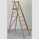 A wooden step ladder,