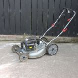 A Rhyas petrol lawnmower