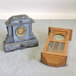 A 19th century black slate mantel clock,