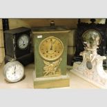 A Regency brass mantel clock, 35cm high, together with a Victorian black slate mantel clock,