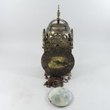 A reproduction brass lantern clock,