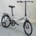 A Dahon Helios folding bicycle,