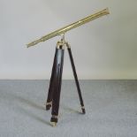 A brass mounted telescope,