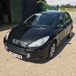 A black 2007 Peugeot 307, 1.6 petrol