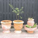 A terracotta garden pot, 55cm high,