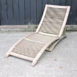 A teak sun lounger