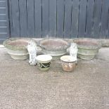 A pair of reconstituted stone planters, 60cm, together with another similar,