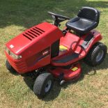 A red Toro Wheelhorse 16-38HXL petrol driven ride on lawnmower