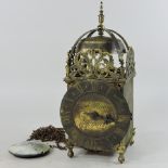 An 18th century style brass lantern clock,