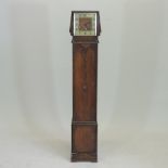 A 1920's oak granddaughter clock,