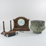 An Edwardian mantel clock, together with a pair of candlesticks,