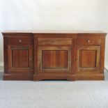 A Regency style mahogany breakfront sideboard,