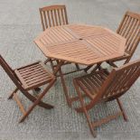 A teak garden table, 107 x 107cm,