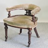 A Victorian mahogany green upholstered armchair