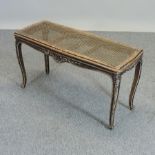 A 19th century single cane footstool,