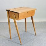 A light oak school desk, stamped Kingfisher, West Bromwich,